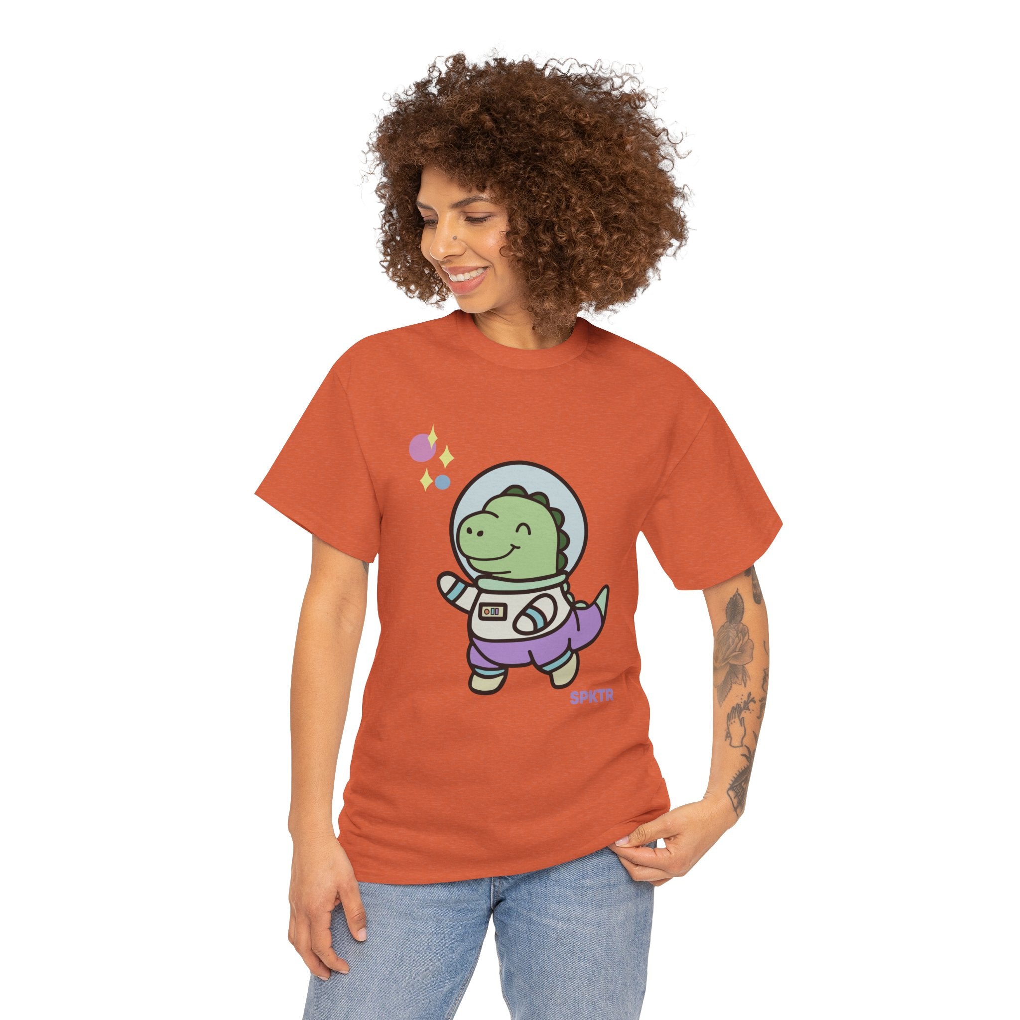 Sunset T-shirt featuring Astronauta, a smiling Teeny-Rex dinosaur floating through space.