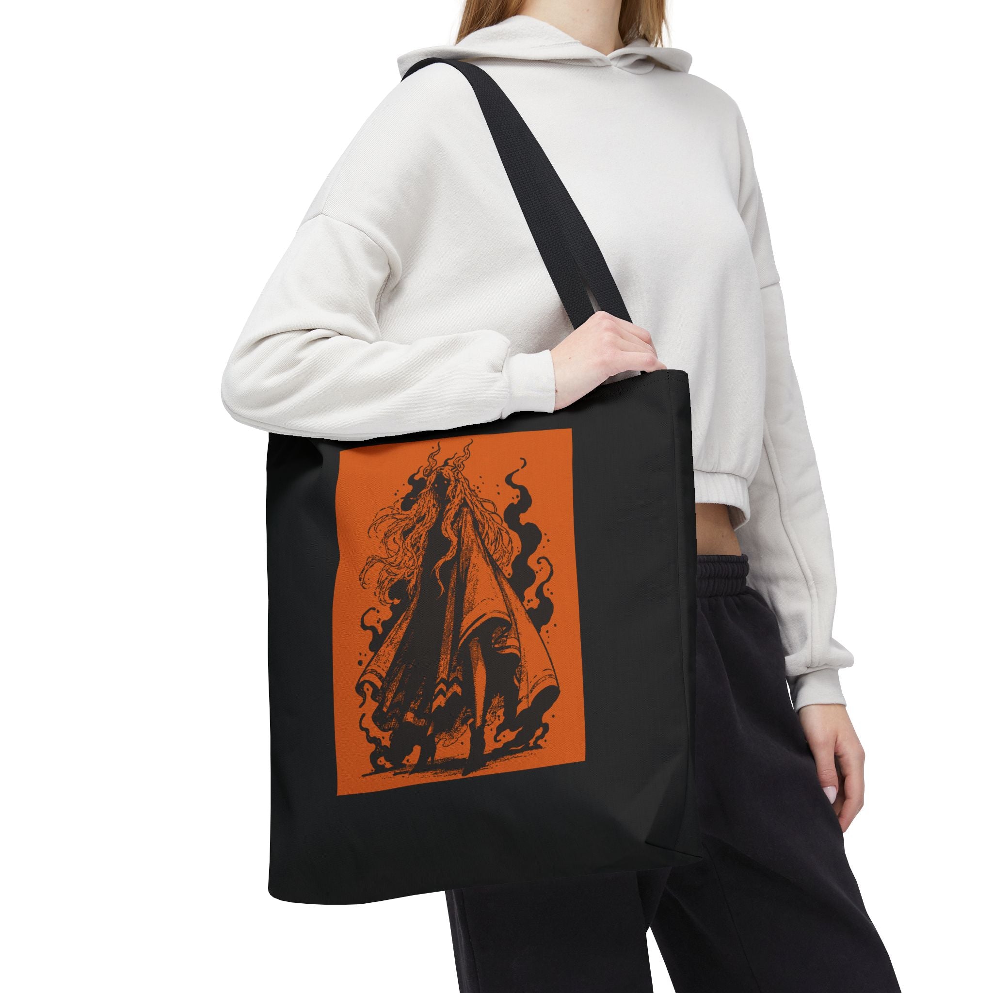 13" x 13 in Black-handle tote bag featuring The Void black-and-orange surreal angel artwork by Anna Aguiar.