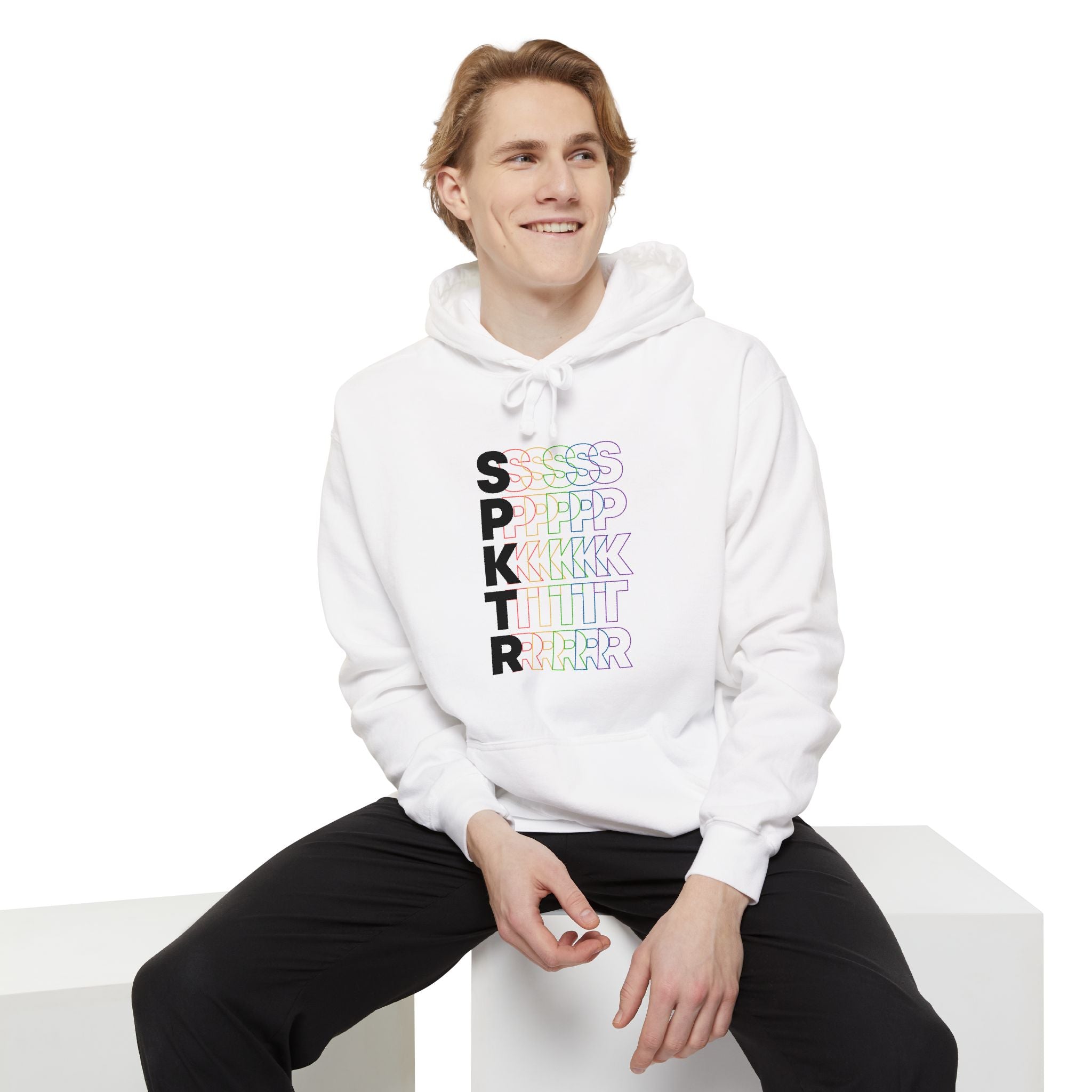 Denim hoodie featuring the SPKTR Pride rainbow design celebrating neurodiversity and LGBTQIA+ pride.