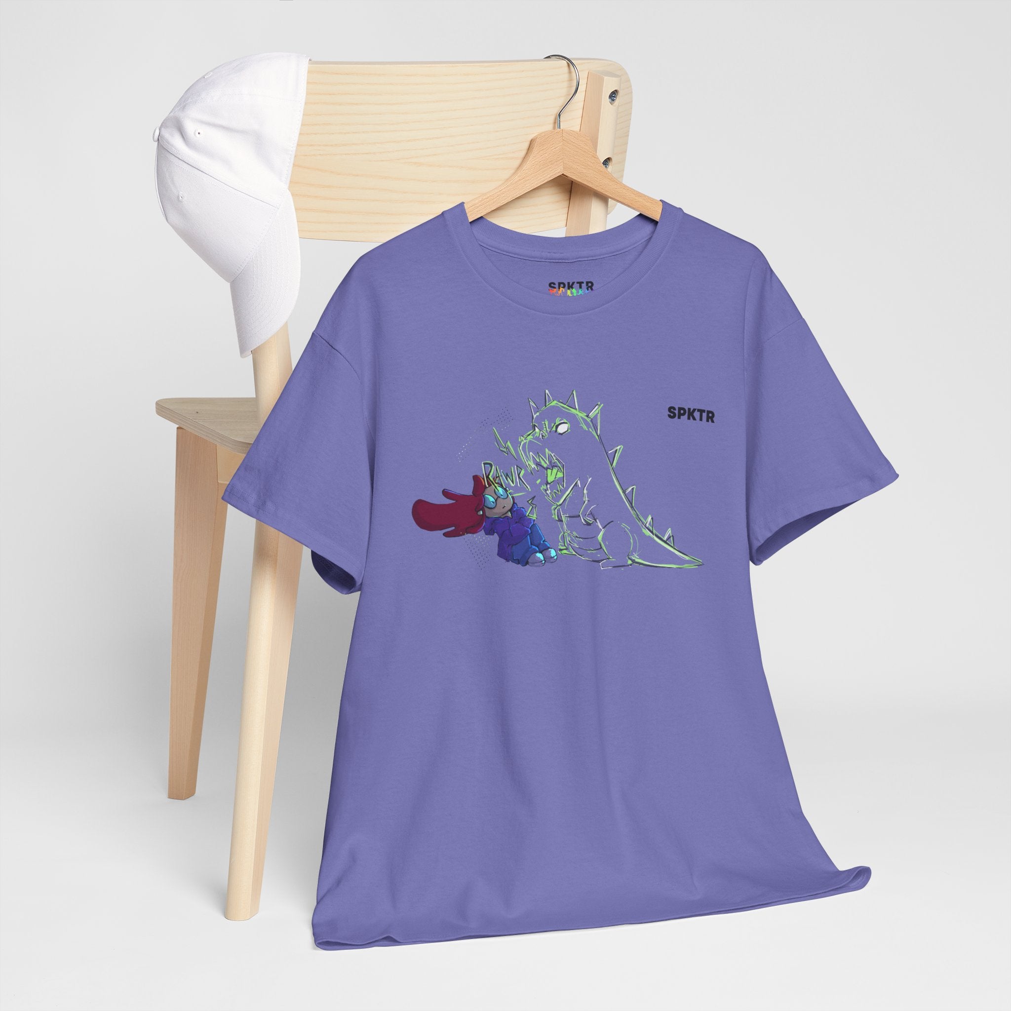 Black T-shirt featuring RAWR! girl and roaring T-Rex artwork by Leticia Ribeiro.