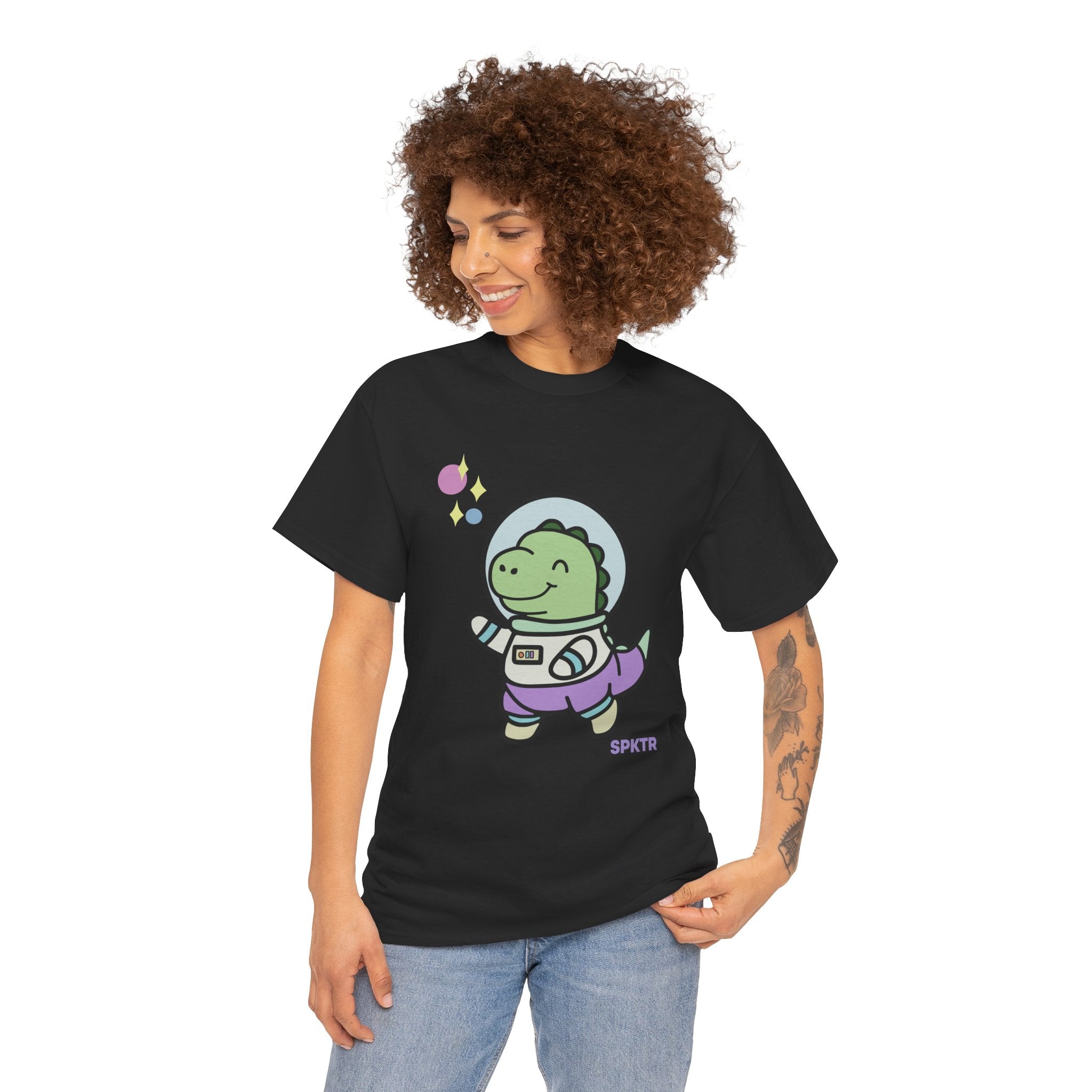 Carolina Blue T-shirt featuring Astronauta, a smiling Teeny-Rex dinosaur floating through space.