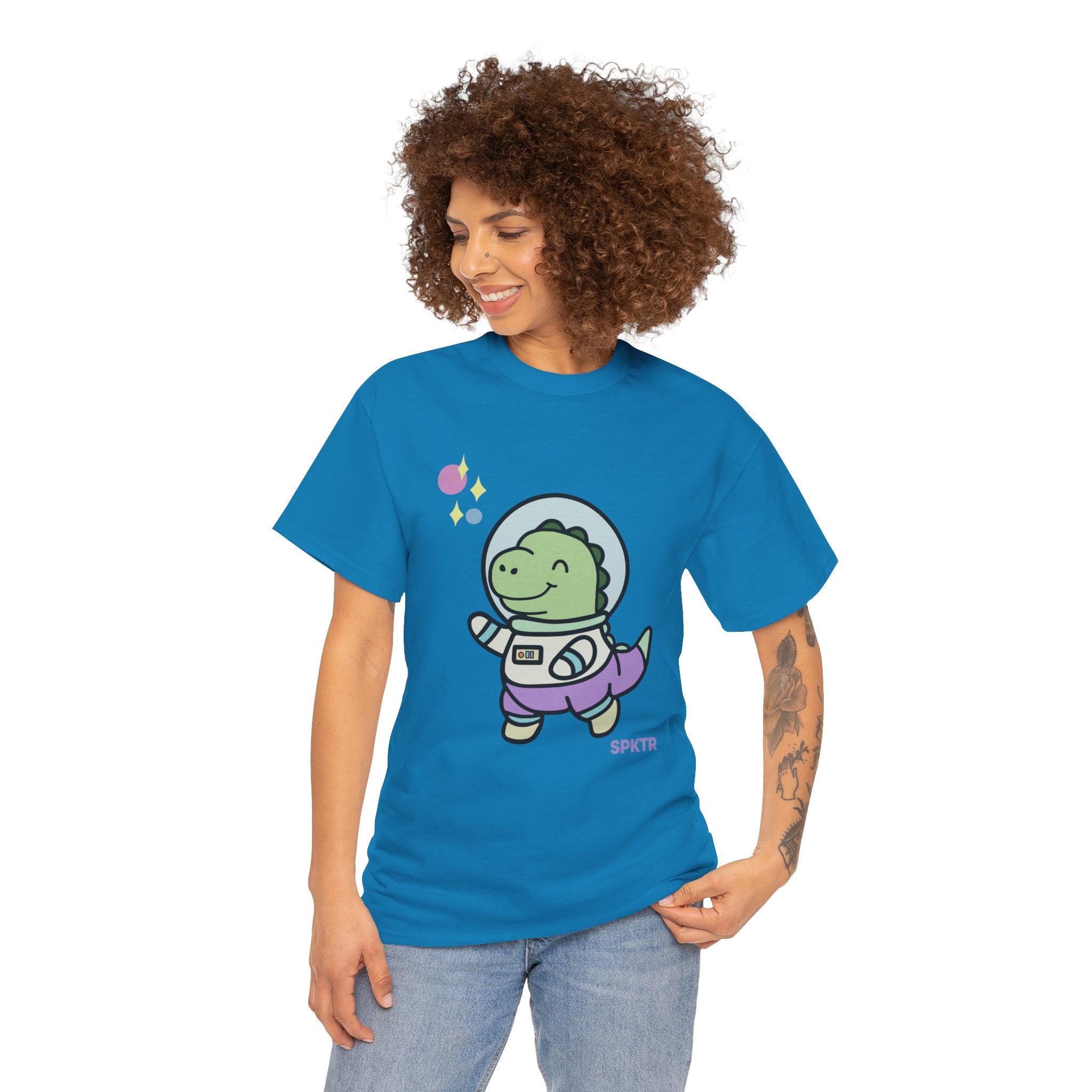 White T-shirt featuring Astronauta, a smiling Teeny-Rex dinosaur floating through space.
