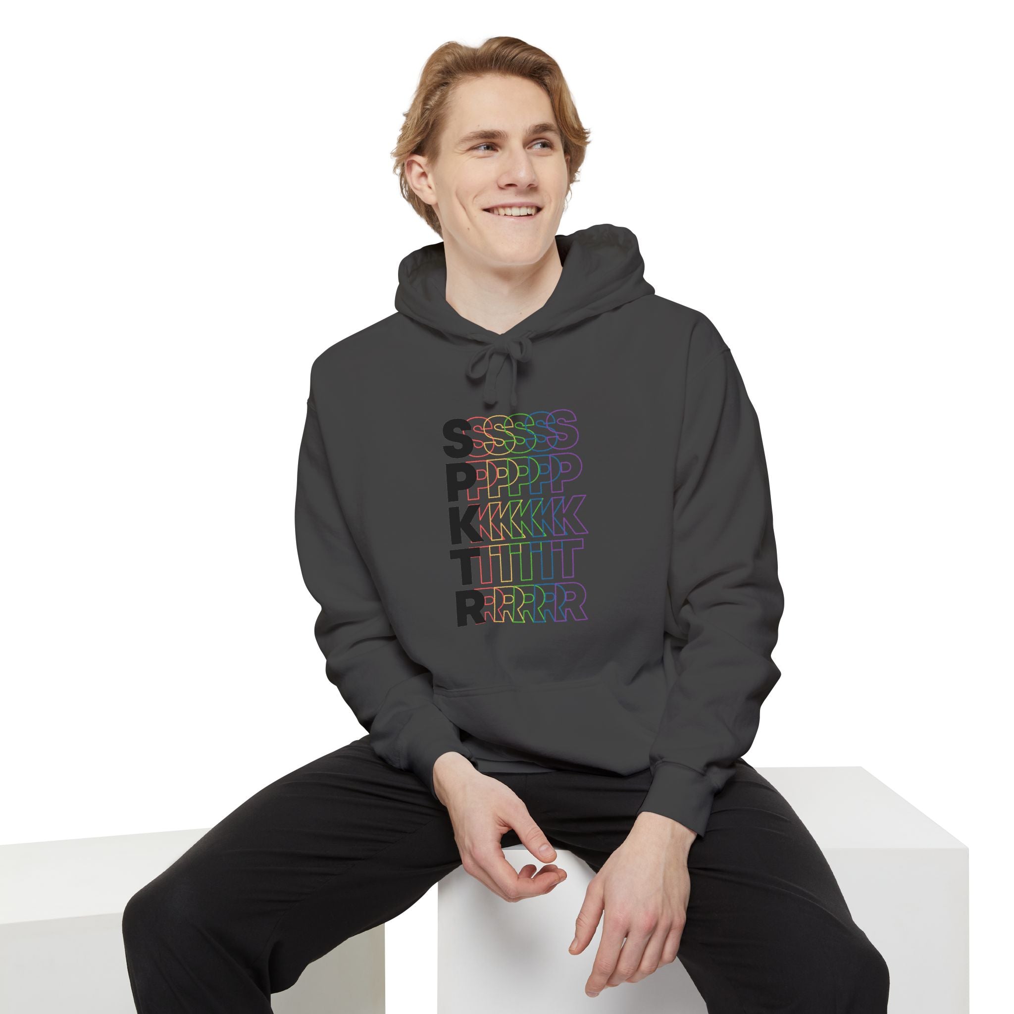 Grey hoodie featuring the SPKTR Pride rainbow design celebrating neurodiversity and LGBTQIA+ pride.