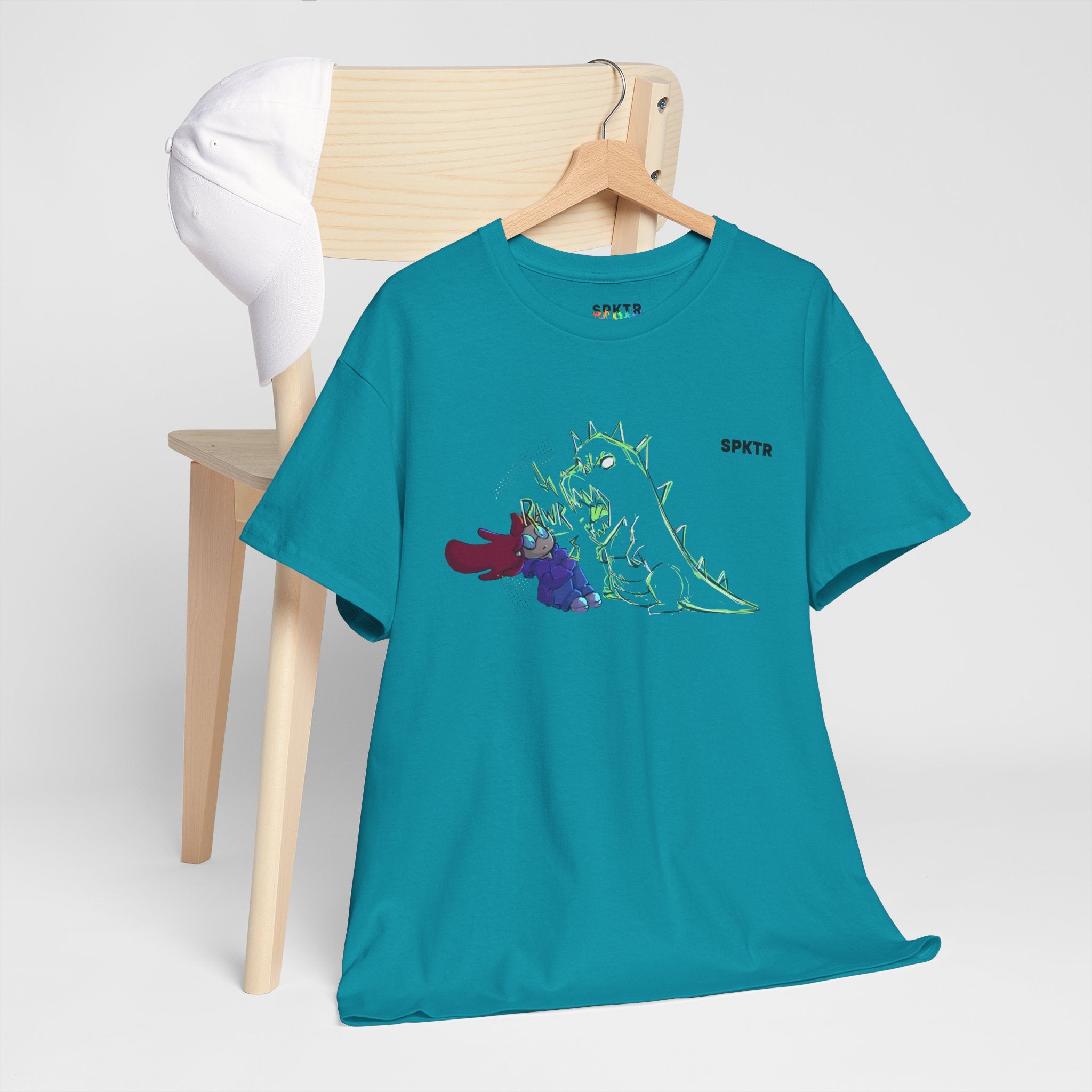 Gravel T-shirt featuring RAWR! girl and roaring T-Rex artwork by Leticia Ribeiro.